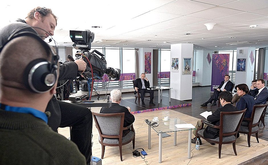 people discussing things on an interview